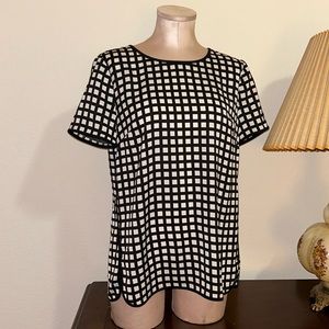 J crew black and white checkered blouse kind of a stretchy synthetic material